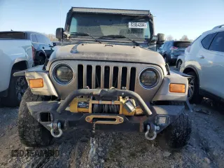 2004 Jeep Wrangler Rubicon with VIN 1J4FA69S94P778836, listed as a Copart auction lot 82884304 with 168,045 mi miles and Salvage Title. Bid and sale history available at carsss.com. Image 5.