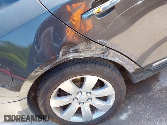 2013 Buick LaCrosse Premium 1 with VIN 1G4GF5E33DF289046, listed as a IAAI auction lot 42261024 with 106,122 mi miles and . Bid and sale history available at DreamBid. Image 6.