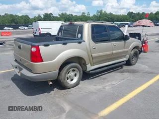 2001 Ford Explorer Sport Trac with VIN 1FMZU67E51UC84439, listed as a IAAI auction lot 42504240 with 290,657 mi miles and . Bid and sale history available at DreamBid. Image 4.
