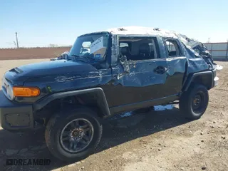 2008 Toyota FJ Cruiser with VIN JTEBU11F38K016727, listed as a IAAI auction lot 41514574 with 173,282 mi miles. Bid and sale history available at carsss.com. Image 6.