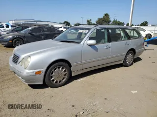 2001 Mercedes-Benz E-Class with VIN WDBJH65J01B276815, listed as a Copart auction lot 75748694 with 208,827 mi miles and Clean Title. Bid and sale history available at carsss.com. Image 1.