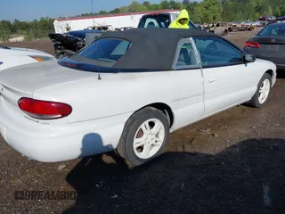 1996 Chrysler Sebring JXi with VIN 3C3EL55H8TT240630, listed as a IAAI auction lot 41969399 with 64,675 mi miles and . Bid and sale history available at DreamBid. Image 4.