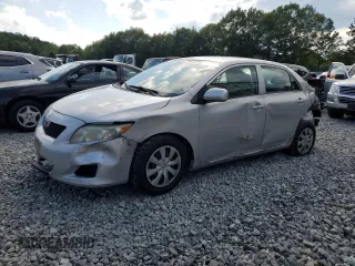 2010 Toyota Corolla with VIN 1NXBU4EE6AZ371162, listed as a Copart auction lot 61877075 with 194,656 mi miles and Clean title. Bid and sale history available at DreamBid. Image 1.