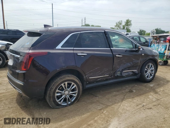 2021 Cadillac XT5 FWD Premium Luxury with VIN 1GYKNCRS9MZ217560, listed as a Copart auction lot 60733295 with 52,242 mi miles and Salvage title. Bid and sale history available at DreamBid. Image 3.