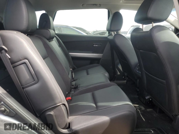 2015 Mazda CX-9 Grand Touring z VIN JM3TB3DA6F0460842, wystawiony jako Copart lot #52630325 z przebiegiem 21 666 mil mil oraz Szkoda całkowita • Salvage title. Historia ofert i sprzedaży dostępna na DreamBid. Obrazek 10.
