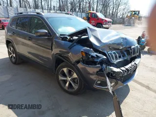 2019 Jeep Cherokee Limited with VIN 1C4PJMDX6KD138423, listed as a IAAI auction lot 41784512 with 86,281 mi miles. Bid and sale history available at carsss.com. Image 1.