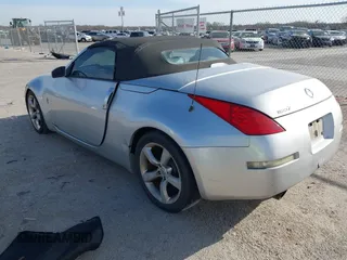 2006 Nissan 350Z Touring z VIN JN1AZ36A56M457175, wystawiony jako IAAI lot #41815565 z przebiegiem 155 869 mil mil oraz . Historia ofert i sprzedaży dostępna na DreamBid. Obrazek 3.