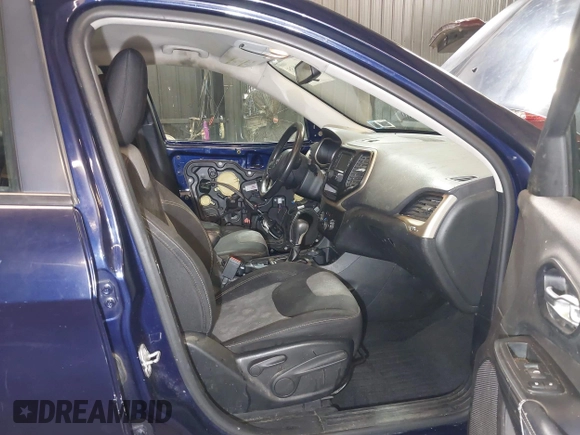 2015 Jeep Cherokee Sport with VIN 1C4PJMAB3FW564055, listed as a IAAI auction lot 42434835 with 237,027 mi miles and . Bid and sale history available at DreamBid. Image 5.