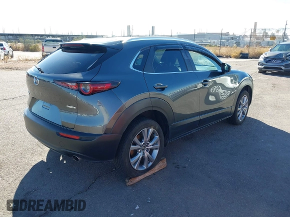 2022 Mazda CX-30 S Select z VIN 3MVDMBBL0NM415511, wystawiony jako IAAI lot #41513247 z przebiegiem Nie podano mil oraz . Historia ofert i sprzedaży dostępna na DreamBid. Obrazek 4.
