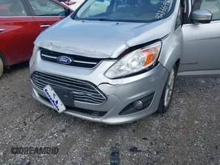 2013 Ford C-Max SEL z VIN 1FADP5BU6DL504301, wystawiony jako IAAI lot #42366960 z przebiegiem 239 190 mil mil oraz . Historia ofert i sprzedaży dostępna na DreamBid. Obrazek 6.