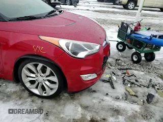 2012 Hyundai Veloster w/Red Int z VIN KMHTC6AD4CU077956, wystawiony jako Copart lot #43504505 z przebiegiem 103 183 mil mil oraz Szkoda całkowita • Salvage title. Historia ofert i sprzedaży dostępna na DreamBid. Obrazek 11.