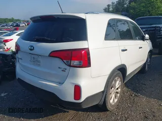 2014 Kia Sorento EX with VIN 5XYKU4A70EG431214, listed as a IAAI auction lot 42231124 with 99,275 mi miles and . Bid and sale history available at DreamBid. Image 4.
