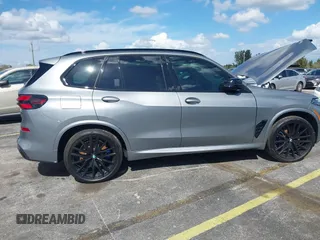 2025 BMW X5 M60i with VIN 5UX33EU03S9X62019, listed as a IAAI auction lot 41623189 with 5,749 mi miles. Bid and sale history available at carsss.com. Image 13.