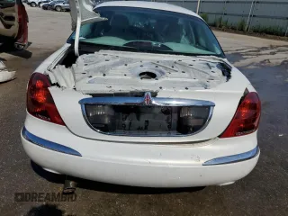 1999 Lincoln Continental with VIN 1LNHM97VXXY680512, listed as a Copart auction lot 58444304 with Not Provided miles and Non Repairable. Bid and sale history available at DreamBid. Image 6.