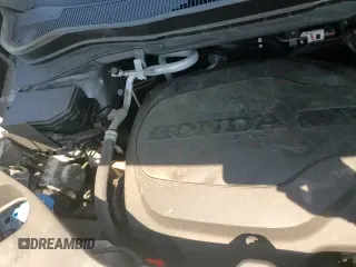 2021 Honda Passport Touring with VIN 5FNYF8H95MB029567, listed as a Copart auction lot 65695625 with 36,336 mi miles and Salvage title. Bid and sale history available at DreamBid. Image 16.