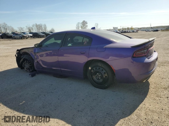 2019 Dodge Charger SXT with VIN 2C3CDXJG5KH520588, listed as a Copart auction lot 54910605 with 58,430 mi miles and Salvage Title. Bid and sale history available at DreamBid. Image 2.