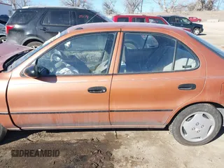 1997 Geo Prizm z VIN 1Y1SK5268VZ443044, wystawiony jako IAAI lot #41705020 z przebiegiem 94 840 mil mil oraz . Historia ofert i sprzedaży dostępna na DreamBid. Obrazek 14.
