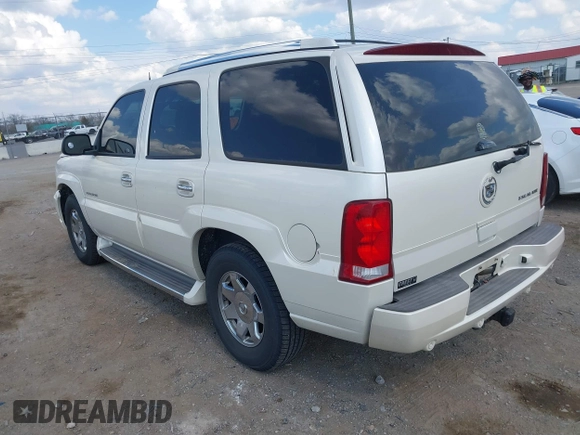 2005 Cadillac Escalade z VIN 1GYEC63T55R115387, wystawiony jako IAAI lot #41791855 z przebiegiem 165 246 mil mil oraz . Historia ofert i sprzedaży dostępna na DreamBid. Obrazek 3.