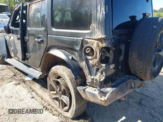 2019 Jeep Wrangler Unlimited Sport S with VIN 1C4HJXDG7KW671598, listed as a IAAI auction lot 42059734 with 63,899 mi miles and . Bid and sale history available at DreamBid. Image 6.