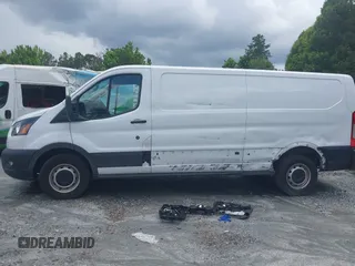 2021 Ford Transit Cargo with VIN 1FTBR1Y83MKA76305, listed as a IAAI auction lot 42240276 with 75,256 mi miles and . Bid and sale history available at DreamBid. Image 14.