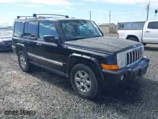 2006 Jeep Commander Limited with VIN 1J8HG58256C173210, listed as a IAAI auction lot 41809396 with 214,864 mi miles. Bid and sale history available at carsss.com. Image 1.
