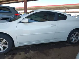 2009 Nissan Altima S z VIN 1N4AL24E99C188516, wystawiony jako IAAI lot #42128770 z przebiegiem 172 666 mil mil oraz . Historia ofert i sprzedaży dostępna na DreamBid. Obrazek 14.