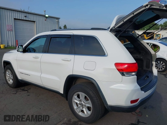2016 Jeep Grand Cherokee Laredo with VIN 1C4RJFAG0GC324917, listed as a IAAI auction lot 42709325 with 271,953 mi miles and . Bid and sale history available at DreamBid. Image 3.