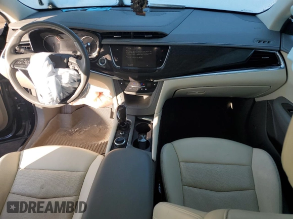 2021 Cadillac XT6 Premium Luxury z VIN 1GYKPCRS5MZ110015, wystawiony jako Copart lot #49323935 z przebiegiem 28 453 mil mil oraz Czysty tytuł • Clean title. Historia ofert i sprzedaży dostępna na DreamBid. Obrazek 8.