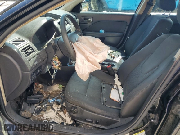 2012 Ford Fusion SE z VIN 3FAHP0HGXCR117692, wystawiony jako Copart lot #56026555 z przebiegiem 236 669 mil mil oraz Szkoda całkowita • Salvage title. Historia ofert i sprzedaży dostępna na DreamBid. Obrazek 7.