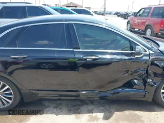2017 Lincoln MKZ Premiere z VIN 3LN6L5A95HR648064, wystawiony jako IAAI lot #42115558 z przebiegiem 86 701 mil mil oraz . Historia ofert i sprzedaży dostępna na DreamBid. Obrazek 13.