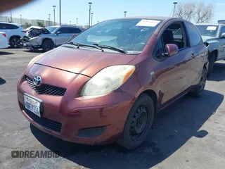 2010 Toyota Yaris with VIN JTDJT4K38A5324103, listed as a IAAI auction lot 41964619 with 149,874 mi miles. Bid and sale history available at carsss.com. Image 2.
