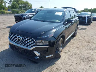 2021 Hyundai Santa Fe SEL z VIN 5NMS64AJ3MH331523, wystawiony jako IAAI lot #42201780 z przebiegiem 84 319 mil mil oraz . Historia ofert i sprzedaży dostępna na DreamBid. Obrazek 6.