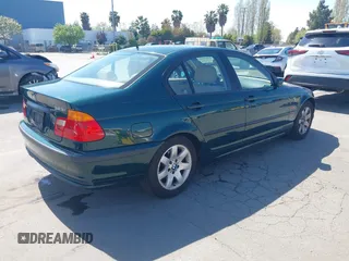 1999 BMW 3 Series 323i with VIN WBAAM3336XFP55691, listed as a IAAI auction lot 42033522 with 129,067 mi miles. Bid and sale history available at carsss.com. Image 4.