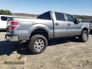 2011 Ford F-150 XLT with VIN 1FTFW1ET9BFC88005, listed as a Copart auction lot 49379465 with 154,459 mi miles and Salvage Title. Bid and sale history available at carsss.com. Image 3.