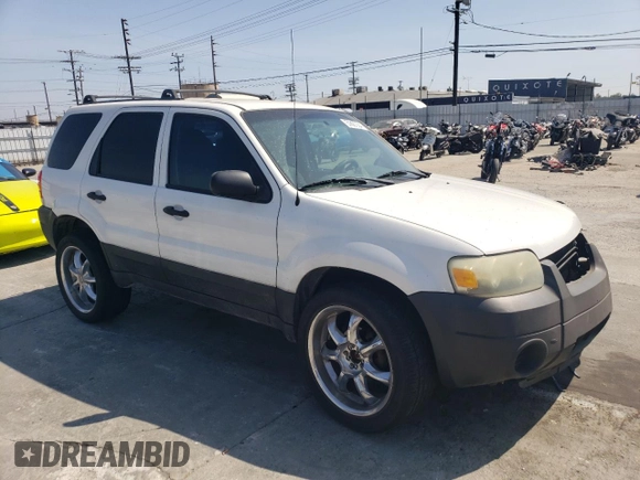 2006 Ford Escape XLS with VIN 1FMCU02Z36KA71926, listed as a Copart auction lot 57697364 with 225,212 mi miles and Salvage title. Bid and sale history available at DreamBid. Image 4.
