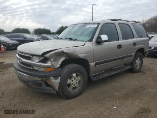 2002 Chevrolet Tahoe LT with VIN 1GNEK13Z02J103049, listed as a Copart auction lot 52364765 with 216,289 mi miles and Salvage Title. Bid and sale history available at carsss.com. Image 1.