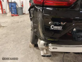 2021 Honda CR-V Touring with VIN 2HKRW2H9XMH653531, listed as a IAAI auction lot 41167970 with 32,228 mi miles. Bid and sale history available at carsss.com. Image 18.