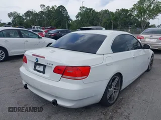 2007 BMW 3 Series 335i with VIN WBAWL73567PX46744, listed as a IAAI auction lot 39120411 with 159,526 mi miles. Bid and sale history available at carsss.com. Image 4.