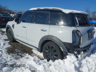2018 MINI Countryman Cooper S z VIN WMZYT5C39J3E19190, wystawiony jako IAAI lot #41364349 z przebiegiem 44 941 mil mil oraz . Historia ofert i sprzedaży dostępna na DreamBid. Obrazek 3.