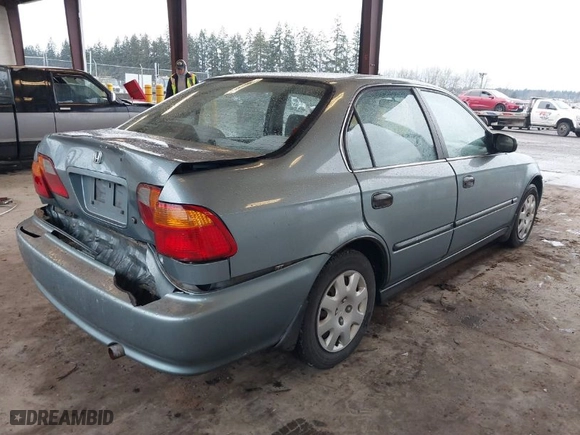2000 Honda Civic LX with VIN 2HGEJ657XYH603719, listed as a IAAI auction lot 41215172 with 209,704 mi miles. Bid and sale history available at carsss.com. Image 4.