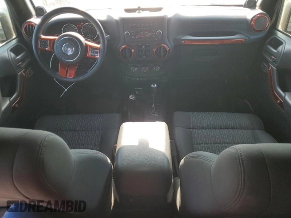 2012 Jeep Wrangler Unlimited Sport with VIN 1C4BJWDG0CL200802, listed as a Copart auction lot 63822365 with 116,501 mi miles and Salvage title. Bid and sale history available at DreamBid. Image 8.