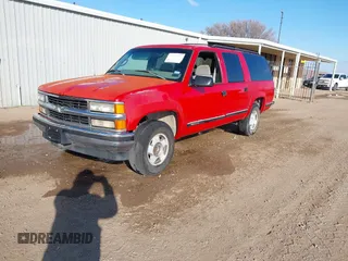 1997 Chevrolet Suburban with VIN 3GNFK16R7VG130092, listed as a IAAI auction lot 41280028 with 211,493 mi miles. Bid and sale history available at carsss.com. Image 2.