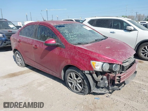 2012 Chevrolet Sonic LT z VIN 1G1JC5SHXC4113696, wystawiony jako IAAI lot #41843938 z przebiegiem 102 111 mil mil oraz . Historia ofert i sprzedaży dostępna na DreamBid. Obrazek 1.