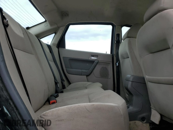 2008 Ford Focus SE with VIN 1FAHP35N38W193540, listed as a Copart auction lot 54869915 with 228,193 mi miles and Salvage Title. Bid and sale history available at DreamBid. Image 10.