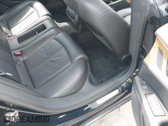 2012 Audi A7 Premium Plus with VIN WAUYGAFC0CN087604, listed as a IAAI auction lot 42747927 with 155,662 mi miles and . Bid and sale history available at DreamBid. Image 8.