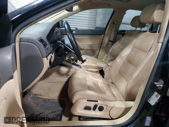 2006 Volkswagen Jetta 1.9L TDI z VIN 3VWDT71K06M752110, wystawiony jako Copart lot #49664635 z przebiegiem 156 883 mil mil oraz Szkoda całkowita • Salvage title. Historia ofert i sprzedaży dostępna na DreamBid. Obrazek 7.