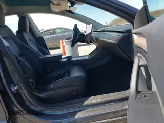 2023 Tesla Model 3 with VIN 5YJ3E1EAXPF652089, listed as a IAAI auction lot 42666520 with 17,679 mi miles and . Bid and sale history available at DreamBid. Image 5.