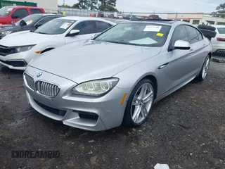 2014 BMW 6 Series 650i z VIN WBA6B2C58ED129639, wystawiony jako IAAI lot #42171786 z przebiegiem 108 677 mil mil oraz . Historia ofert i sprzedaży dostępna na DreamBid. Obrazek 17.