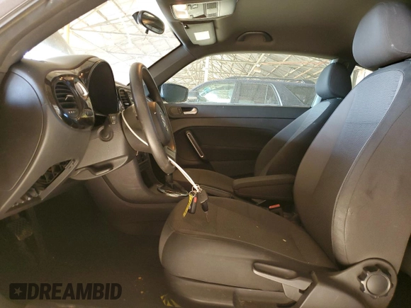 2013 Volkswagen Beetle Entry with VIN 3VWFP7AT5DM660333, listed as a Copart auction lot 55804995 with 89,249 mi miles and Clean Title. Bid and sale history available at DreamBid. Image 7.