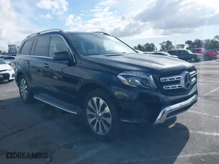 2019 Mercedes-Benz GLS with VIN 4JGDF6EE1KB228308, listed as a IAAI auction lot 41442443 with 128,233 mi miles. Bid and sale history available at carsss.com. Image 1.